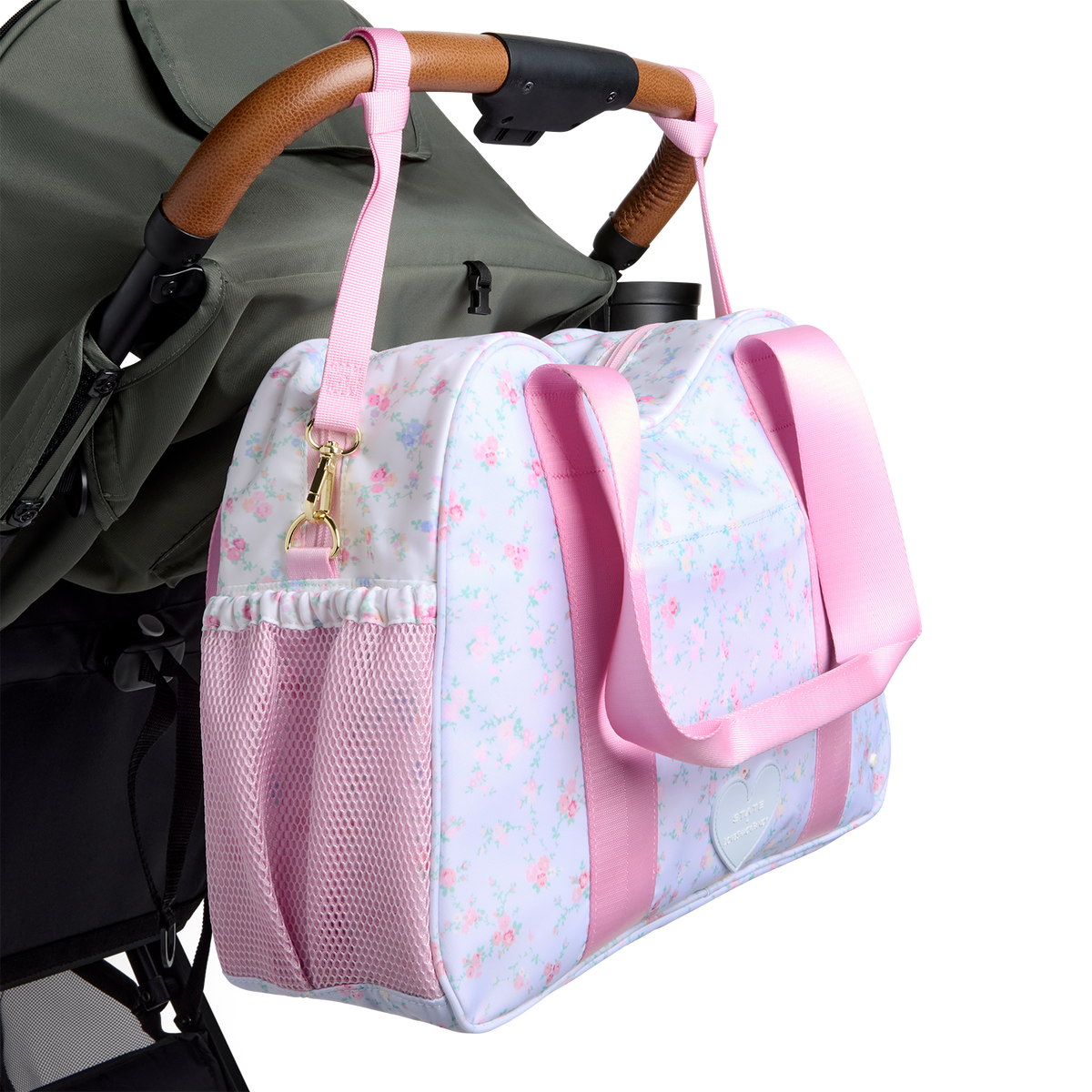 STATE x LoveShackFancy Bella Diaper Tote Confetti Bloom / Wildflower Blue on stroller