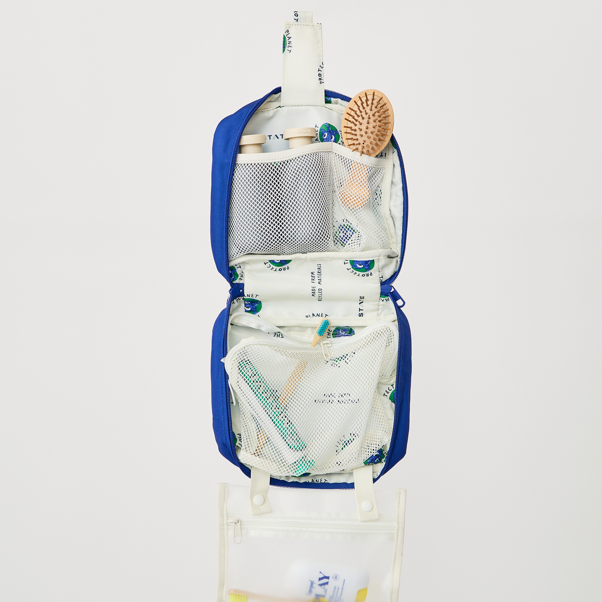 Image showing bensen toiletry kit hanging with toiletry items inside