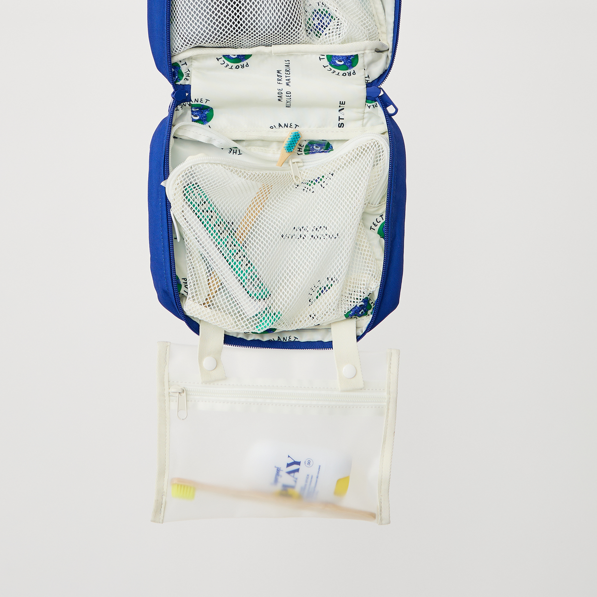 Image showing bensen toiletry kit hanging with toiletry items inside