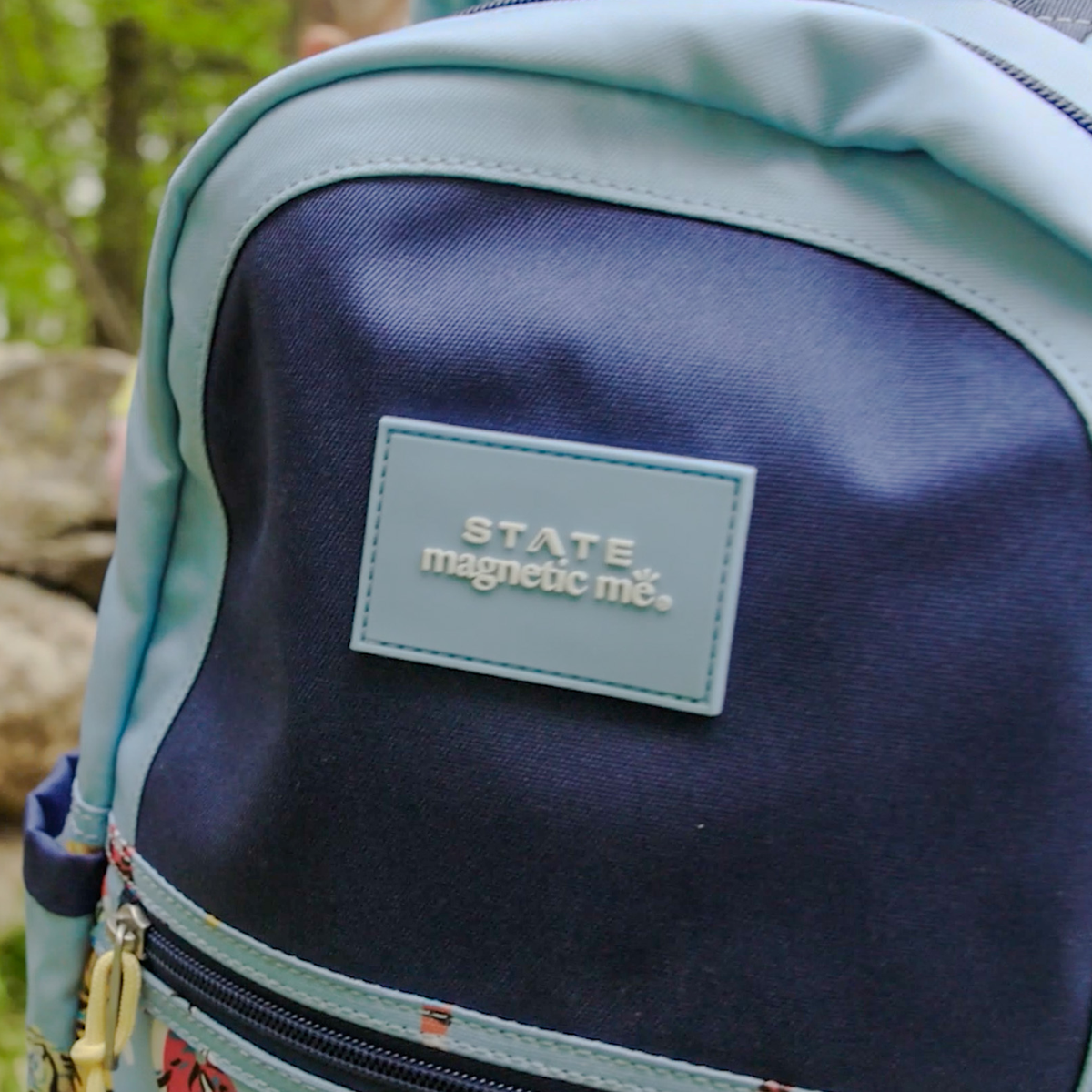 Boy wearing STATE x MagneticMe Kane Mini Backpack Tigers