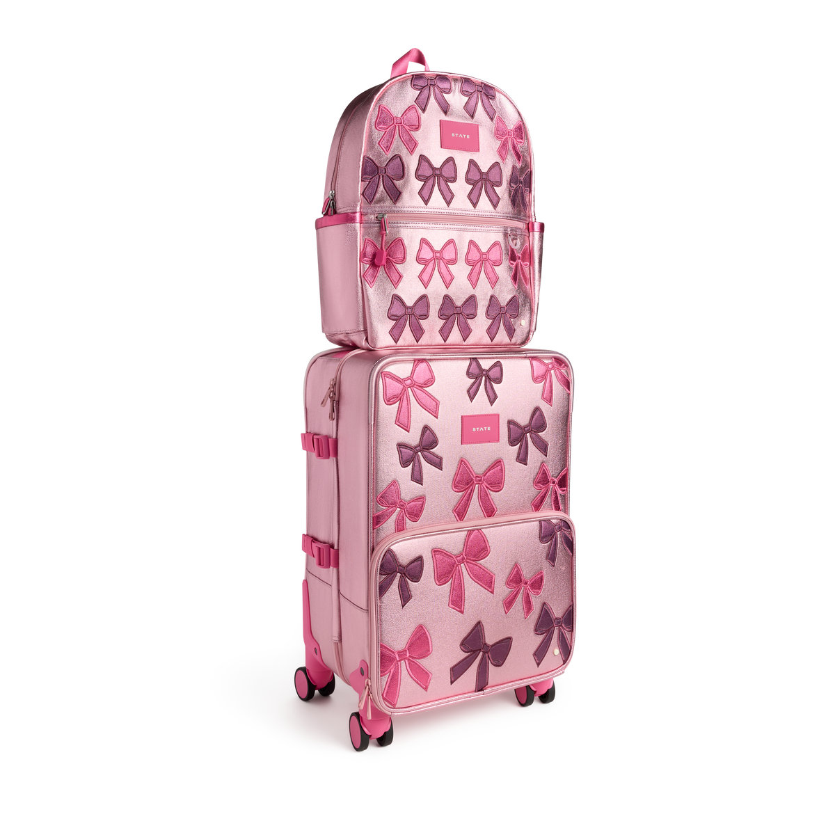 STATE Bags Kane Backpack on Logan Carry-On Suitcase Patchwork Bows Front View Click to Zoom